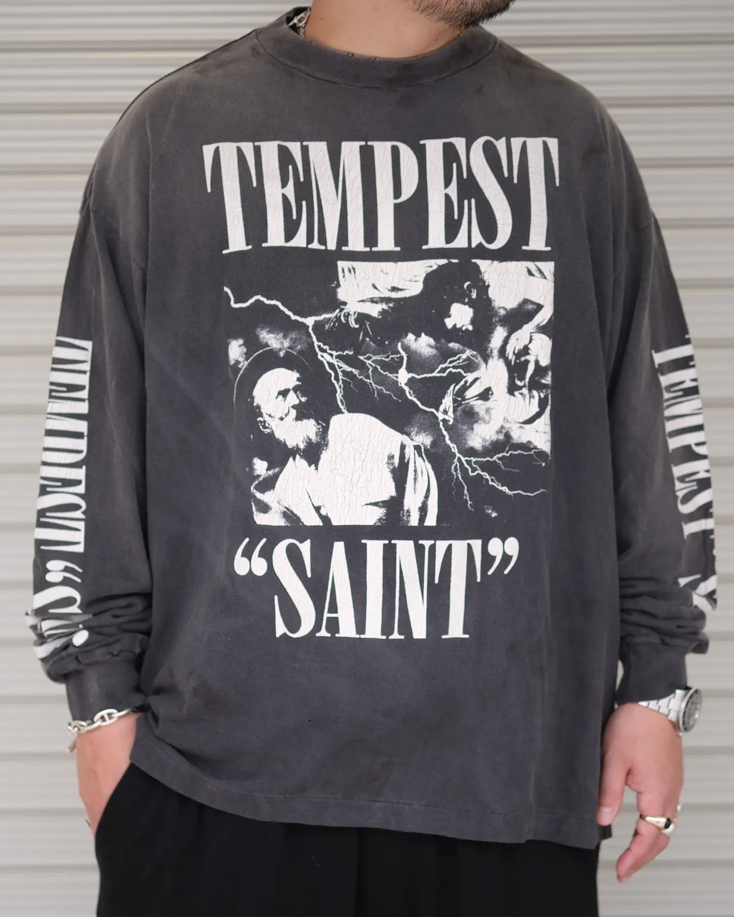 SAINT Mxxxxxx LS TEE/TEMPEST/BLK 'TEMPEST SAINT' Storm Religious Saints Cracked Retro Vulcanized Heavy Wash Long Sleeves Washed Black S-XL Assute Dyeing Multi-bit Horse Fading Craftsmanship Grinding and Hanging Holes Full of Old Feeling Top Printing Craftsmanship Purchasing Level